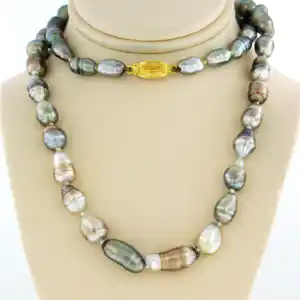 18k gouden slot aan een parelcollier - 50 cm verkocht voor € 125!