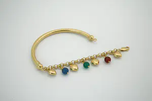 34 - Fraaie 18Krt  geel gouden armband met 7 hangertjes kopen? Bied vanaf 560!