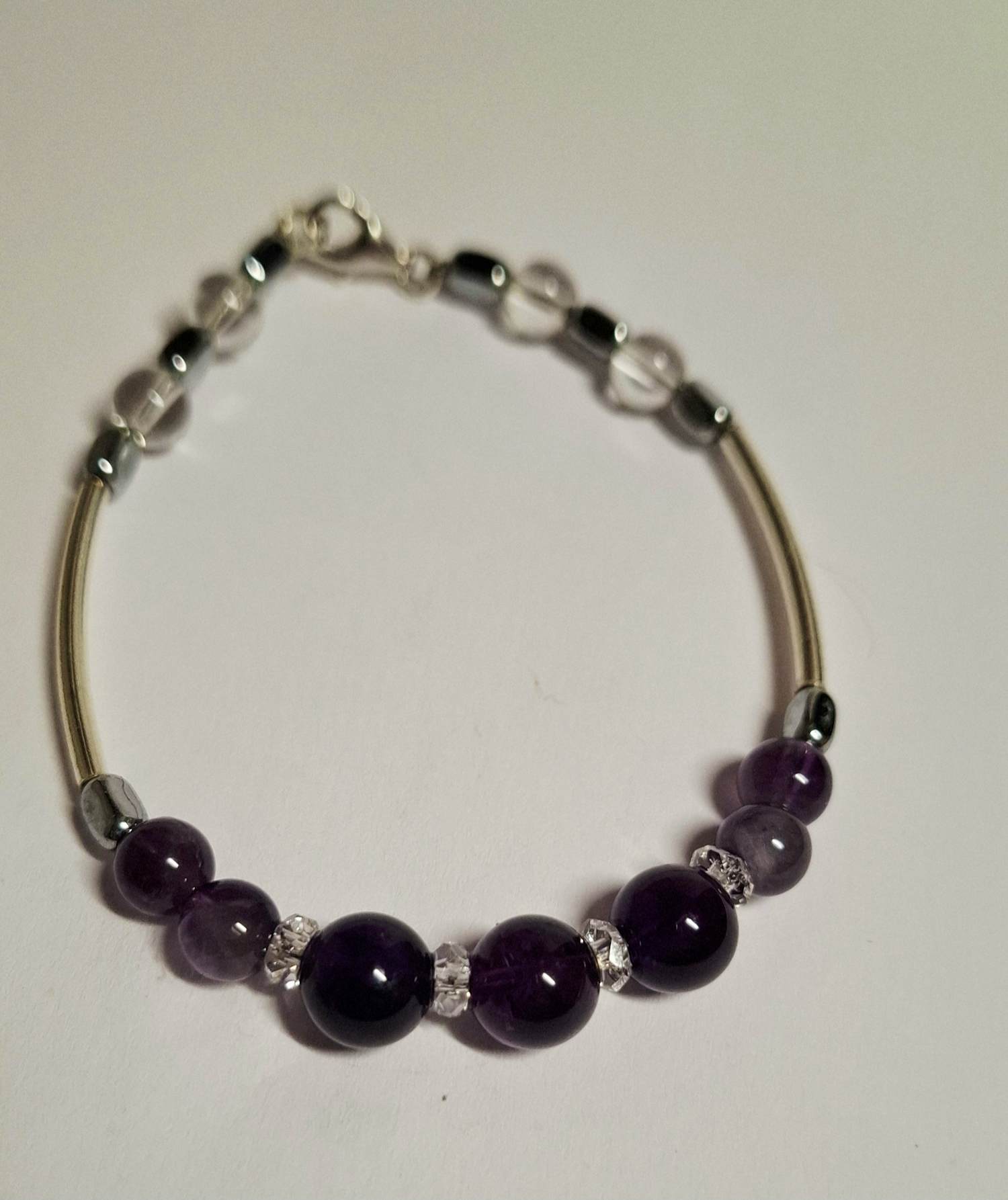 Nieuwe zilveren armband met Amethist edelsteen en bergkristal kopen? Bied vanaf 70!