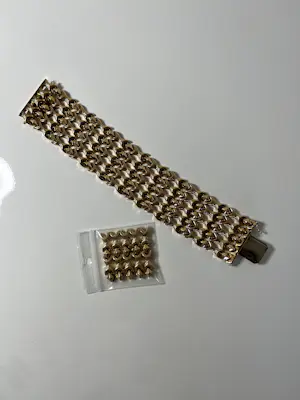 Opvallende 18 karaat geelgouden brede armband kopen? Bied vanaf 6000!