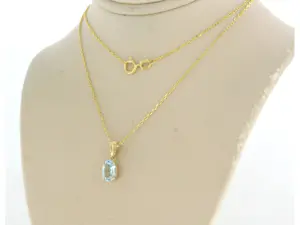 14k gouden collier met hanger bezet met blauwe topaas tot. 0,90ct - 45 cm lang kopen? Bied vanaf 220!