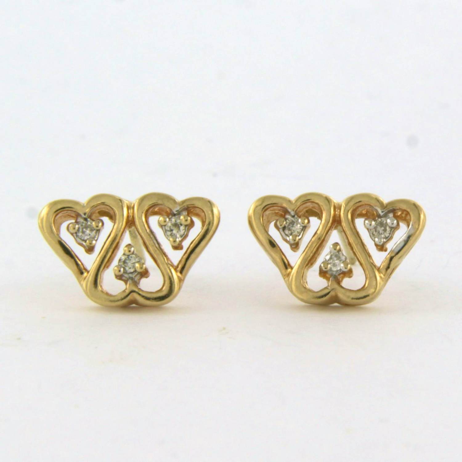 14k geelgouden oorknoppen bezet met briljant geslepen diamant 0.06ct kopen? Bied vanaf 145!
