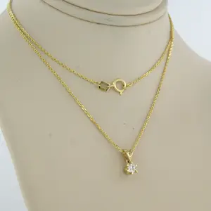14k geelgouden collier met een hanger bezet met briljant geslepen diamant 0.11ct kopen? Bied vanaf 230!