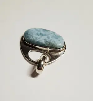 AcheterNieuwe zilveren hanger met larimar? Enchérissez de 40!