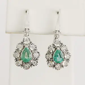 Oorbellen met smaragd en diamanten kaufen? Bieten Sie von 1250!