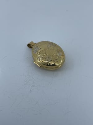 18kt gouden medaillon fotohanger  2,28 gr kopen? Bied vanaf 120!