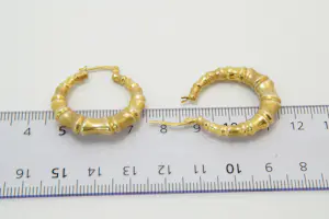 33- Groot paar 14 karaats  geel gouden oorclips - bamboe model kopen? Bied vanaf 140!