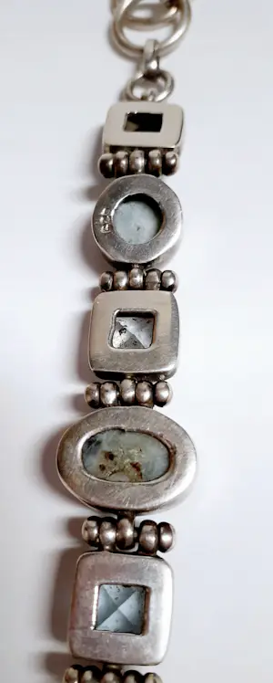 Zilveren Armband bezet met ovale facetgeslepen Aquamarijn en ovale turkoois kopen? Bied vanaf 85!