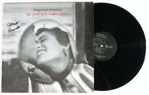 Elliott Erwitt - Gesigneerd op hoes van Fairground Attraction ‎– The First Of A Million Kisses verkocht voor € 1!