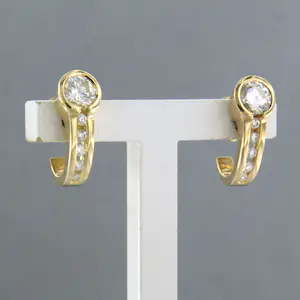 18k bicolor gouden oorbellen met briljant geslepen diamant 0.60 ct kopen? Bied vanaf 600!