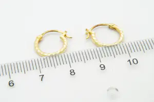 18-  Leuke set 18 karaats geel-gouden oorringetjes - kleine maat - kindermodel kopen? Bied vanaf 40!