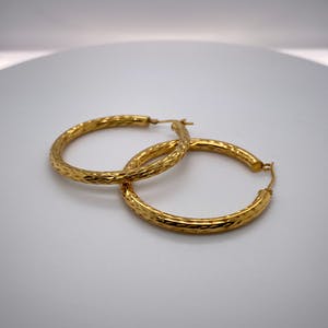 9kt gouden oorringen, 35mm , 2,02gr kopen? Bied vanaf 50!