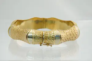 41-  Zware (32.6gr) & fraai bewerkte 18kt gouden bi color armband kopen? Bied vanaf 1340!