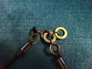 Langani - Verfijnde ketting met de zwarte parel in aardetinten, koper en goud kopen? Bied vanaf 45!