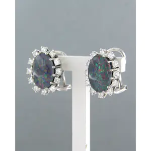 14k witgouden oorclips met doublet opaal en briljant geslepen diamant 0,66 ct kopen? Bied vanaf 800!