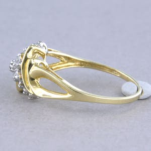 14k bicolor gouden ring bezet met briljant geslepen diamanten tot. 0,13ct kopen? Bied vanaf 1!