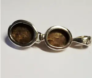 Nieuwe handgemaakte  langwerpige zilveren hanger met een mooie tijgerogen kopen? Bied vanaf 60!