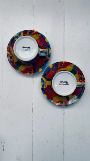 Corneille - set van 2 kop en schotels (porselein) in kleurrijk diermotief kopen? Bied vanaf 40!