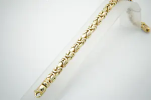 21 - Robuuste, vrijwel nieuwe 14 karaats geel-gouden "Konings" armband kopen? Bied vanaf 900!