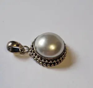 Nieuwe zilveren hanger met Mabe parel kopen? Bied vanaf 75!