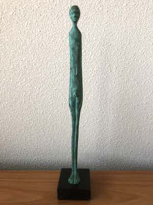 Paolo SIMONCINI - Slank brons beeld van naakte man. verkocht voor € 50!