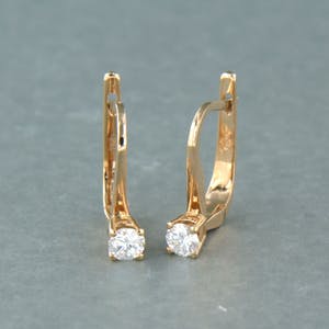 18k gouden solitair oorhangers bezet met briljant geslepen diamant tot. 0,18ct kopen? Bied vanaf 280!