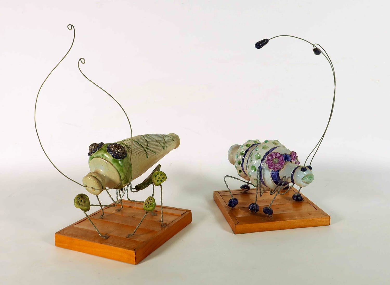 Agnes Berck - Twee insecten van keramiek en ijzer verkocht voor € 50!