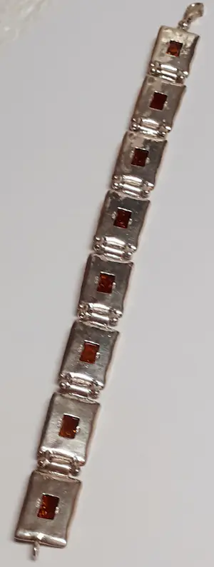 AcheterIn nieuwstaat .Zilveren armband bezet met natuurlijke rechthoekige Barnsteen? Enchérissez de 100!