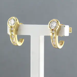 18k bicolor gouden oorbellen met briljant geslepen diamant 0.60 ct kopen? Bied vanaf 600!