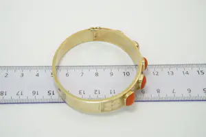 35-  Zware & fraai bewerkte 14 karaat gouden armband met bloedkoraal kopen? Bied vanaf 1400!