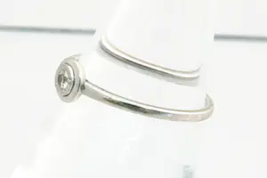 41- Exclusieve -Diamond point- witgouden solitairring met 0.05crt briljant kopen? Bied vanaf 110!