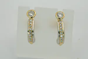74- Fraaie set bicolor 18krt goud & diamanten oorstekers -ca.0.40ct diamant kopen? Bied vanaf 280!