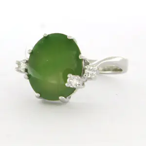 14k wit gouden ring bezet met jade en briljant geslepen diamant tot. 0.10ct kopen? Bied vanaf 350!