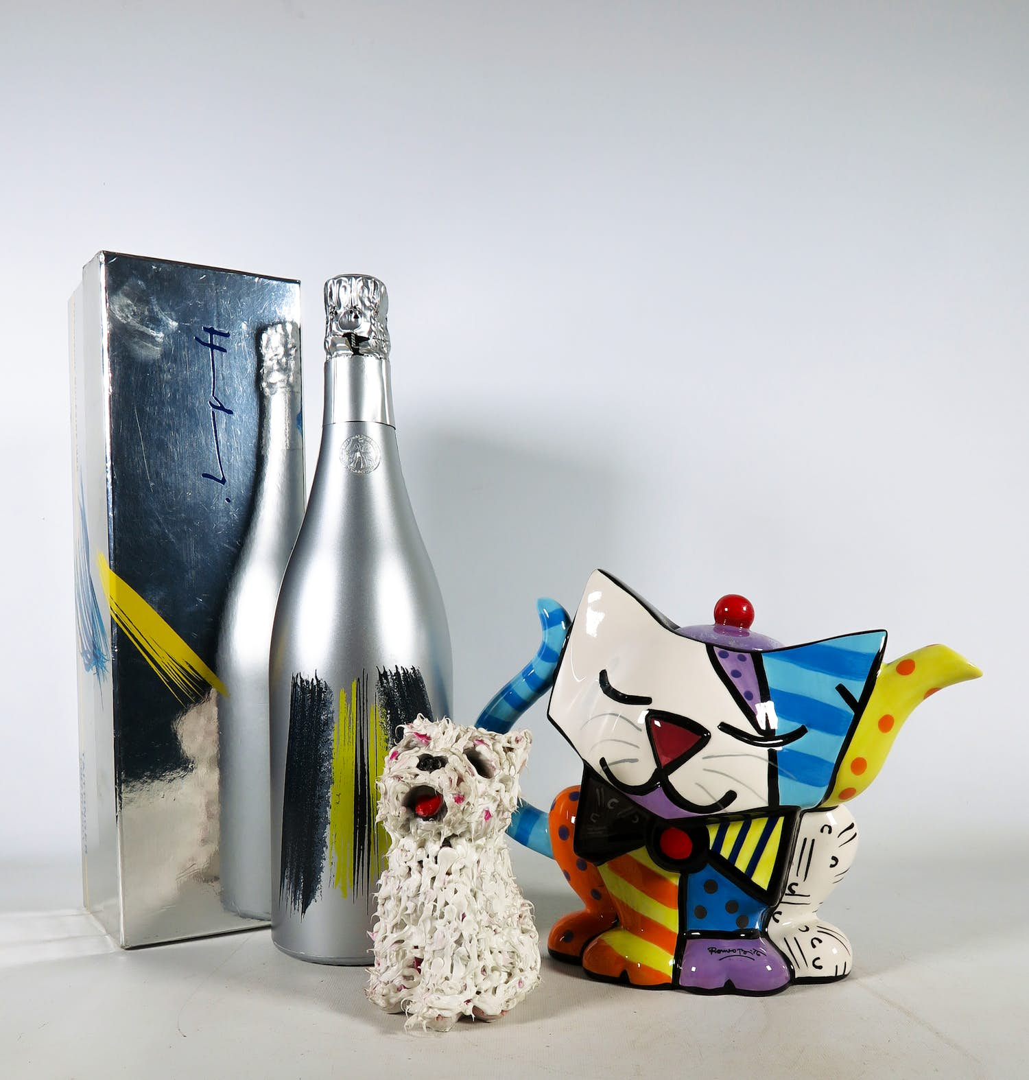 Hans Hartung - Arjan van Arendonk en Romero Britto - Lot van champagne, theepot en Bilbao Puppy kopen? Bied vanaf 70!