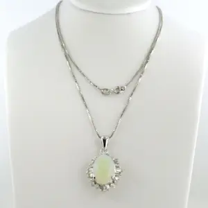 18k gouden collier en hanger met  opaal en briljant en taper geslepen diamant kaufen? Bieten Sie von 1300!