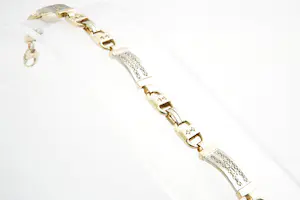 109- Zware 18Krt bicolor gouden & diamanten (0.50ct) fantasie armband kopen? Bied vanaf 1670!