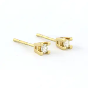 18k geel gouden solitair oorknoppen met briljant geslepen diamant tot. 0,18ct kopen? Bied vanaf 325!