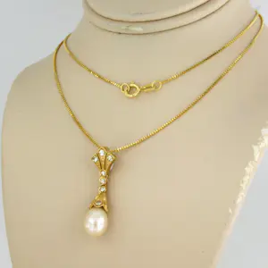 14k gouden collier met hanger met parel en single cut geslepen diamant kopen? Bied vanaf 285!