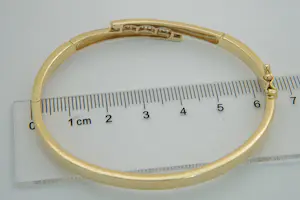 76 - Elegante bicolor 14Krt gouden dames armband met 10 diamanten (0.20ct) kopen? Bied vanaf 490!