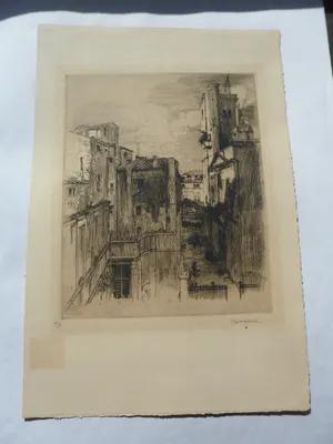Armand Coussens - Gezicht op een stad in het Zuiden. Ets en droge naald kopen? Bied vanaf 10!