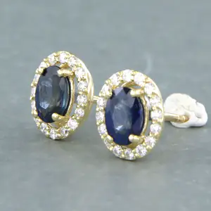 14k gouden oorknoppen met saffier en geslepen diamanten tot. 0,20ct kopen? Bied vanaf 280!