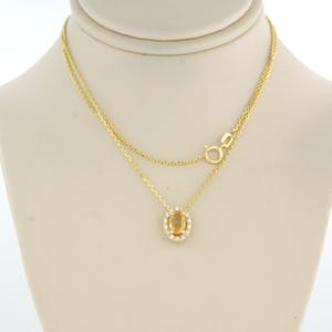 14kgouden collier met hanger bezet met gele saffier en briljant geslepen diamant kopen? Bied vanaf 1!