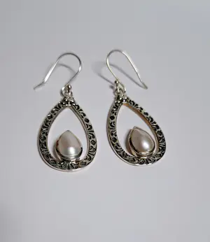 Nieuwe zilveren oorbellen met zoetwater parel kopen? Bied vanaf 40!