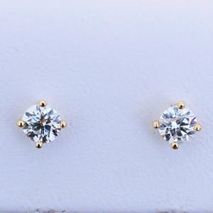 0.62 ct Diamond Solitaire Earrings kopen? Bied vanaf 450!