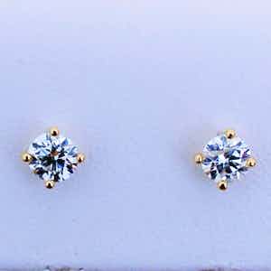 0.62 ct Diamond Solitaire Earrings verkocht voor € 450!