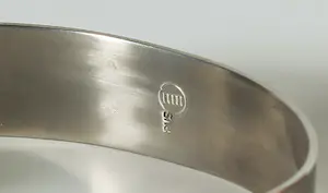 Menno Meijer - Lot van vijf armbanden van roestvrijstaal en messing kopen? Bied vanaf 50!