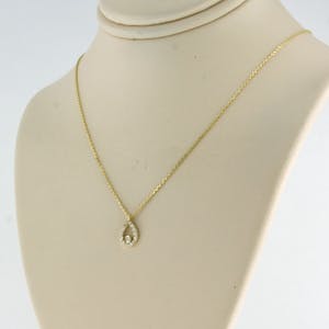 14k gouden collier met hanger bezet met briljant geslepen diamant tot. 0,07ct kopen? Bied vanaf 1!