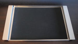 Dirk Wynants - Design dienblad Extremis Serva Tray rvs + placemat Extremis kopen? Bied vanaf 45!