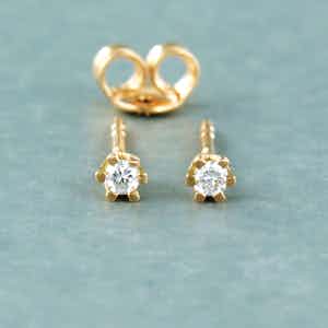18k roségouden oorknoppen bezet met briljant geslepen diamant tot. 0,08ct verkocht voor € 1!