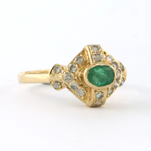 18k gouden ring bezet met smaragd en briljant geslepen diamant tot. 0.18ct kopen? Bied vanaf 220!